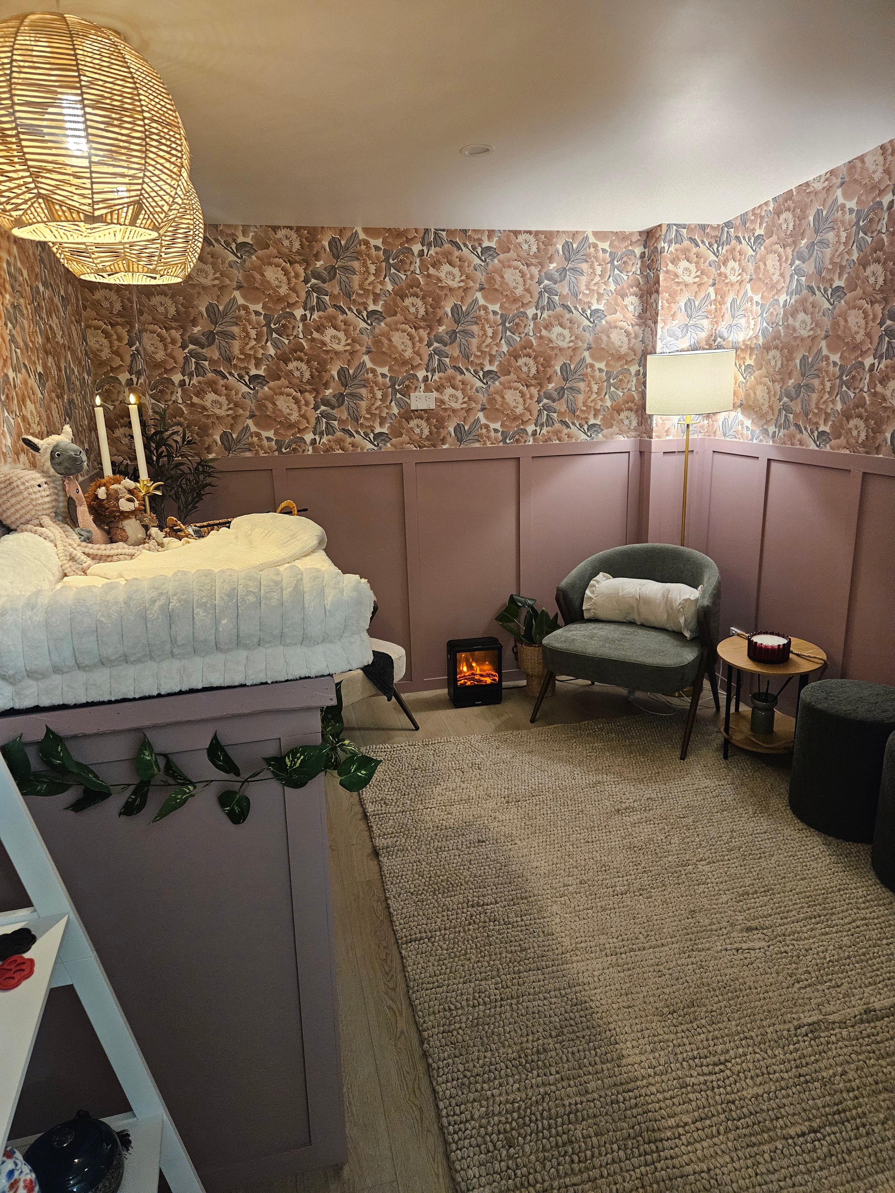 A quiet corner of the FAREWELL Room with warm lighting and floral details