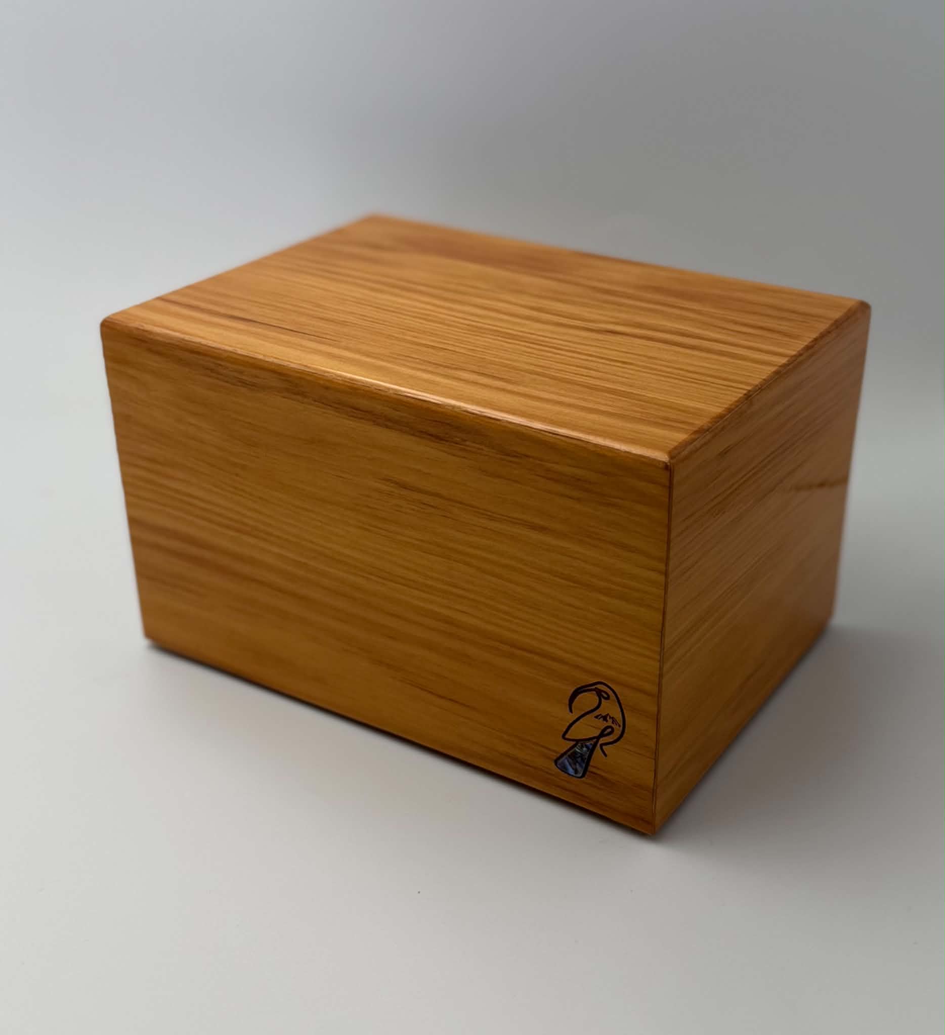 Huia Urn — handcrafted premium hardwood urn in rimu, walnut, or Tasmanian blackwood